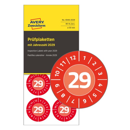 Sheet of red circular inspection labels showing number 29 and months