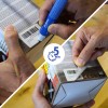 Hands using an Avery glue pen to remove a barcode sticker from a product box